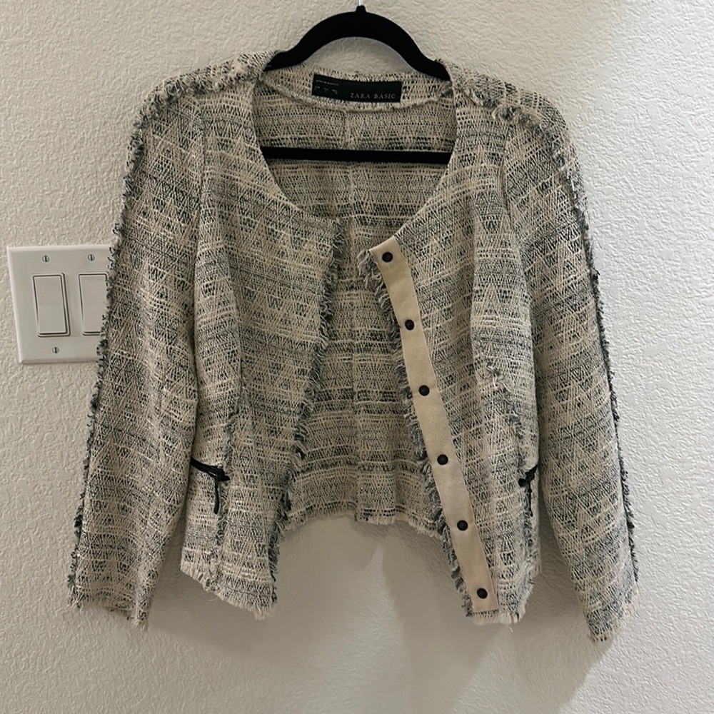 Cropped tweed jacket.